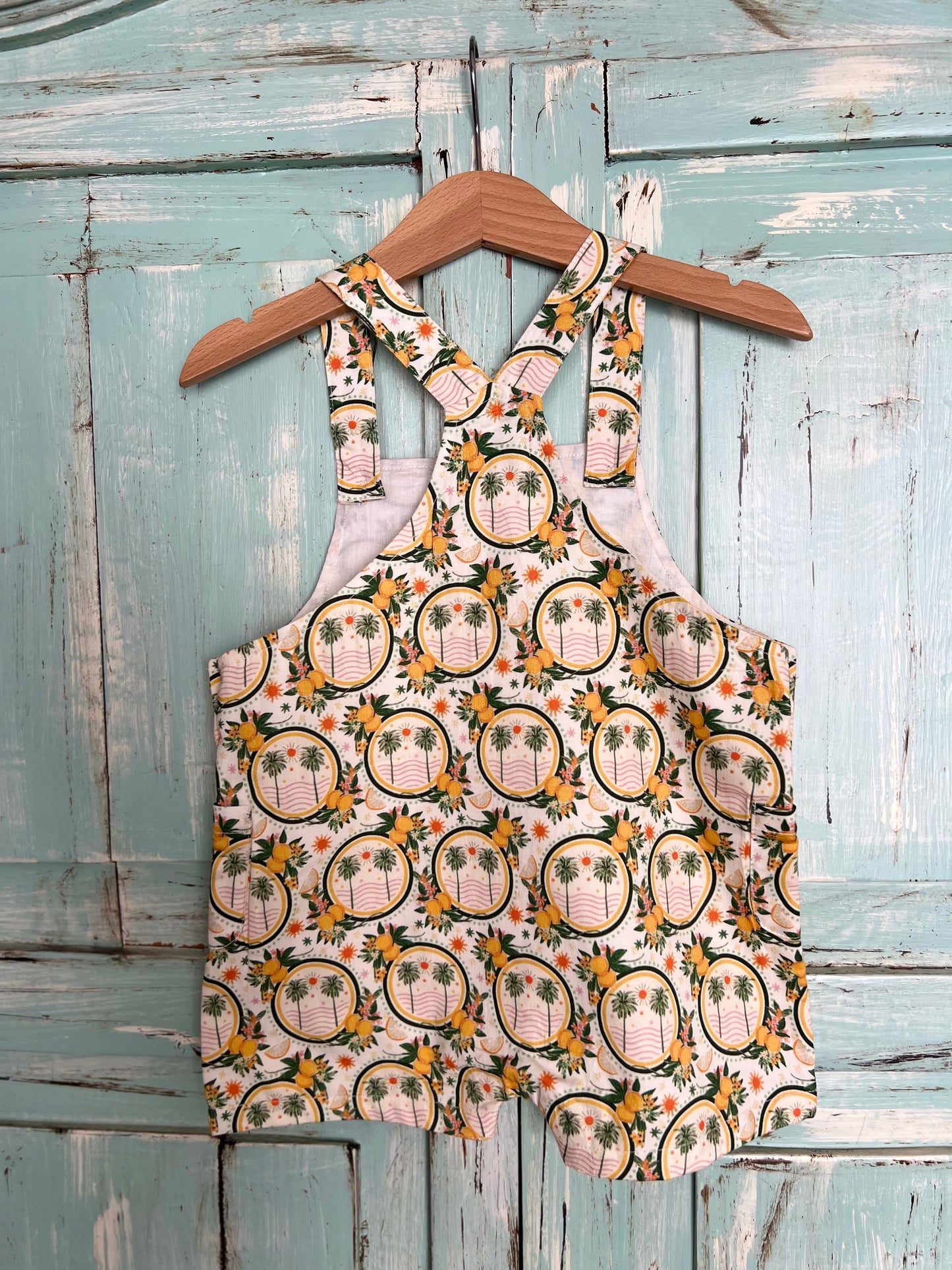 Lucy romper in palms