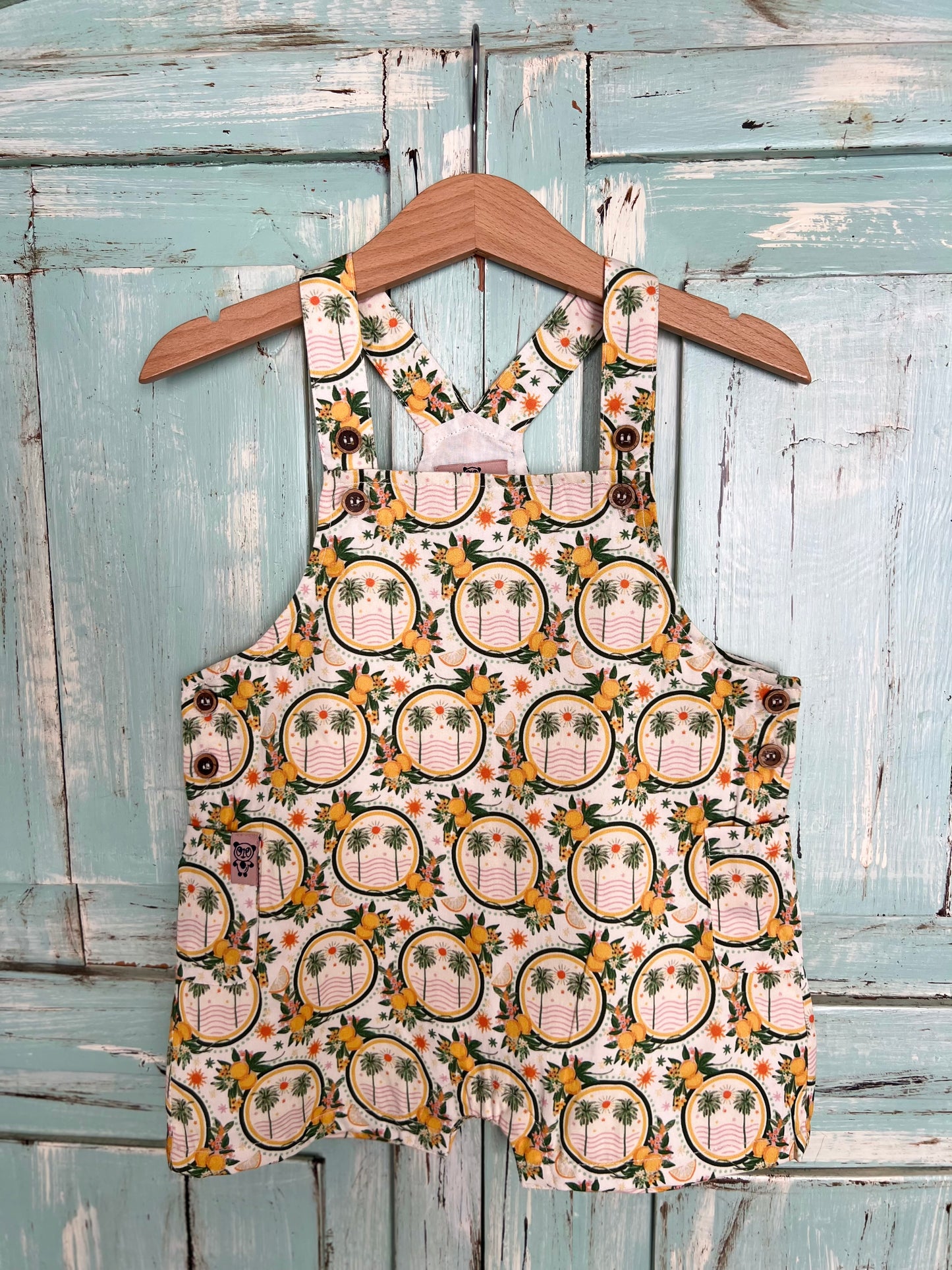 Lucy romper in palms