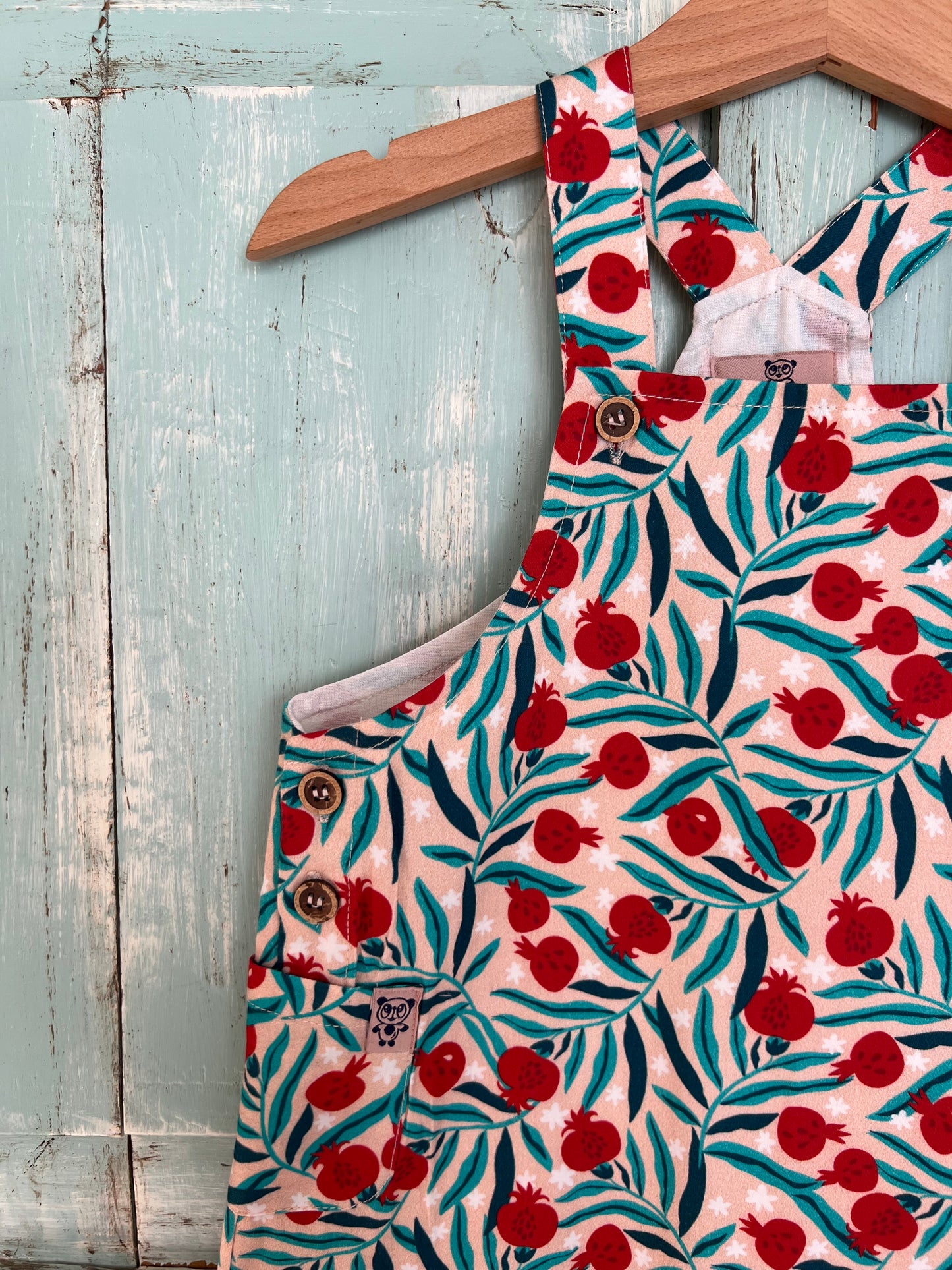 Lucy romper in pomegranate