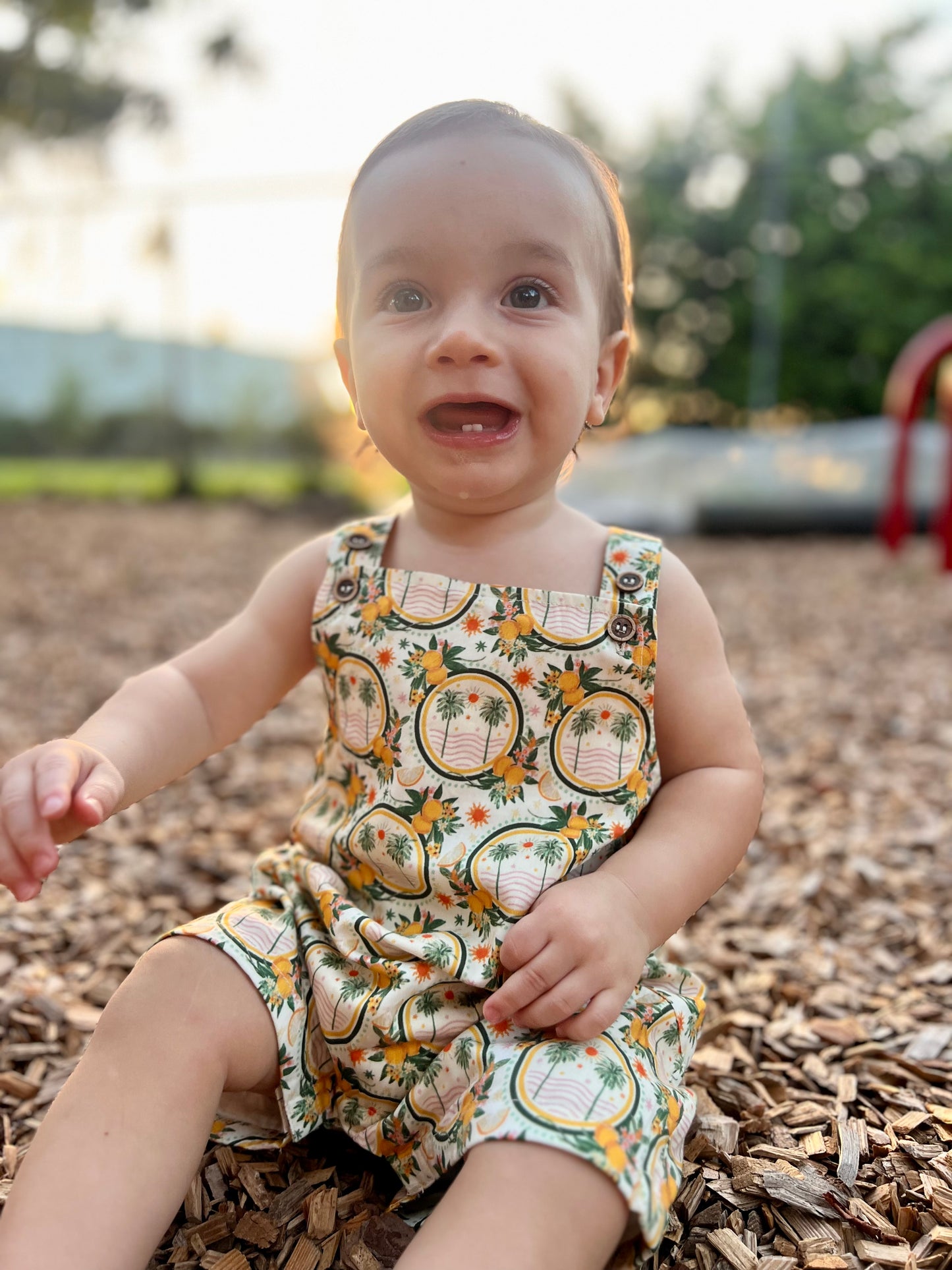 Lucy romper in palms