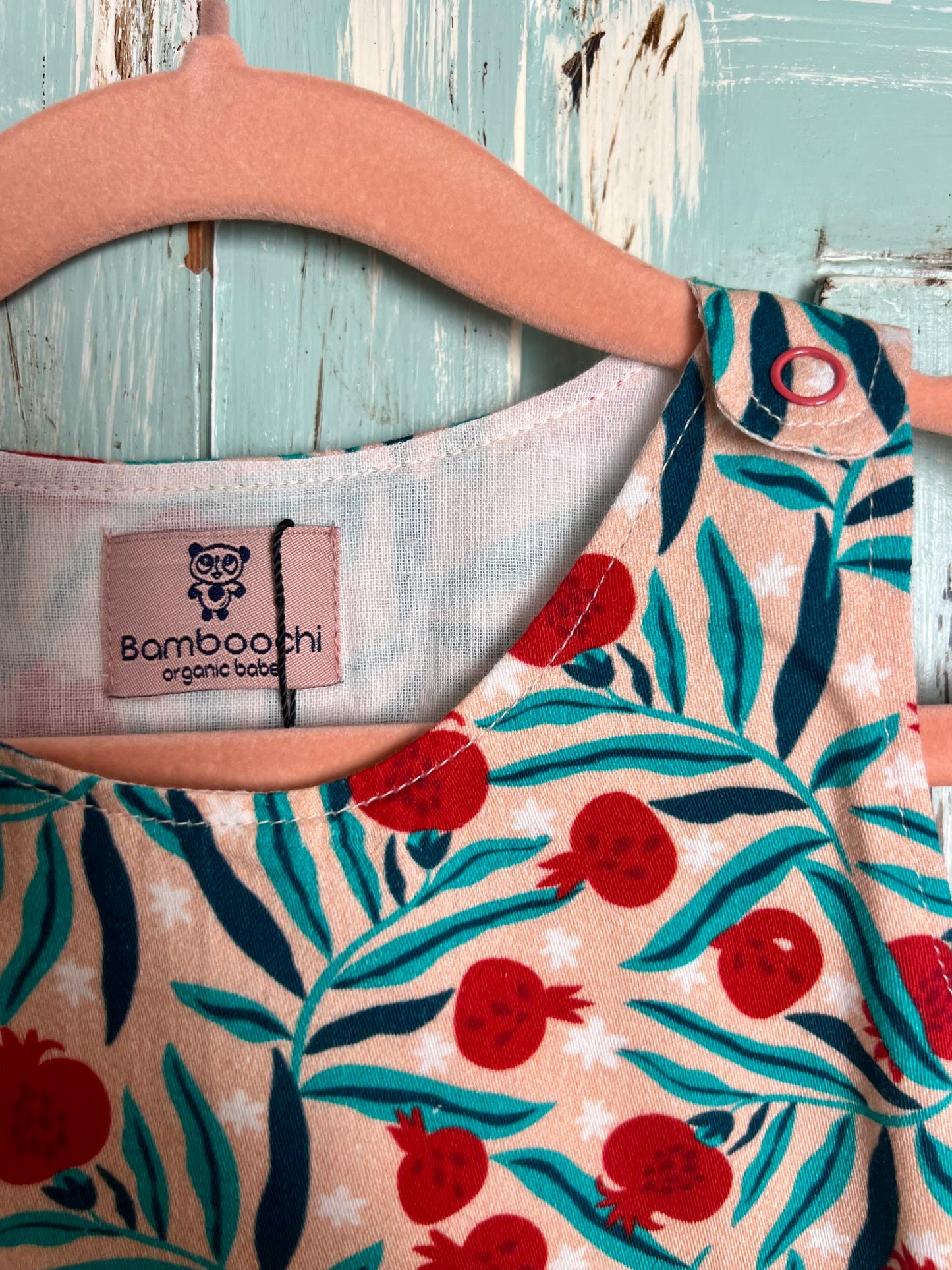 Gigi onesie in Pomegranate