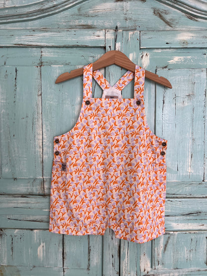 organic cotton floral print romper for babies, 9-18 months, soft breathable, made from sustainable materials.
Featuring snap buttons for easy diapers changes. Inside linen for more comfort on baby skin
