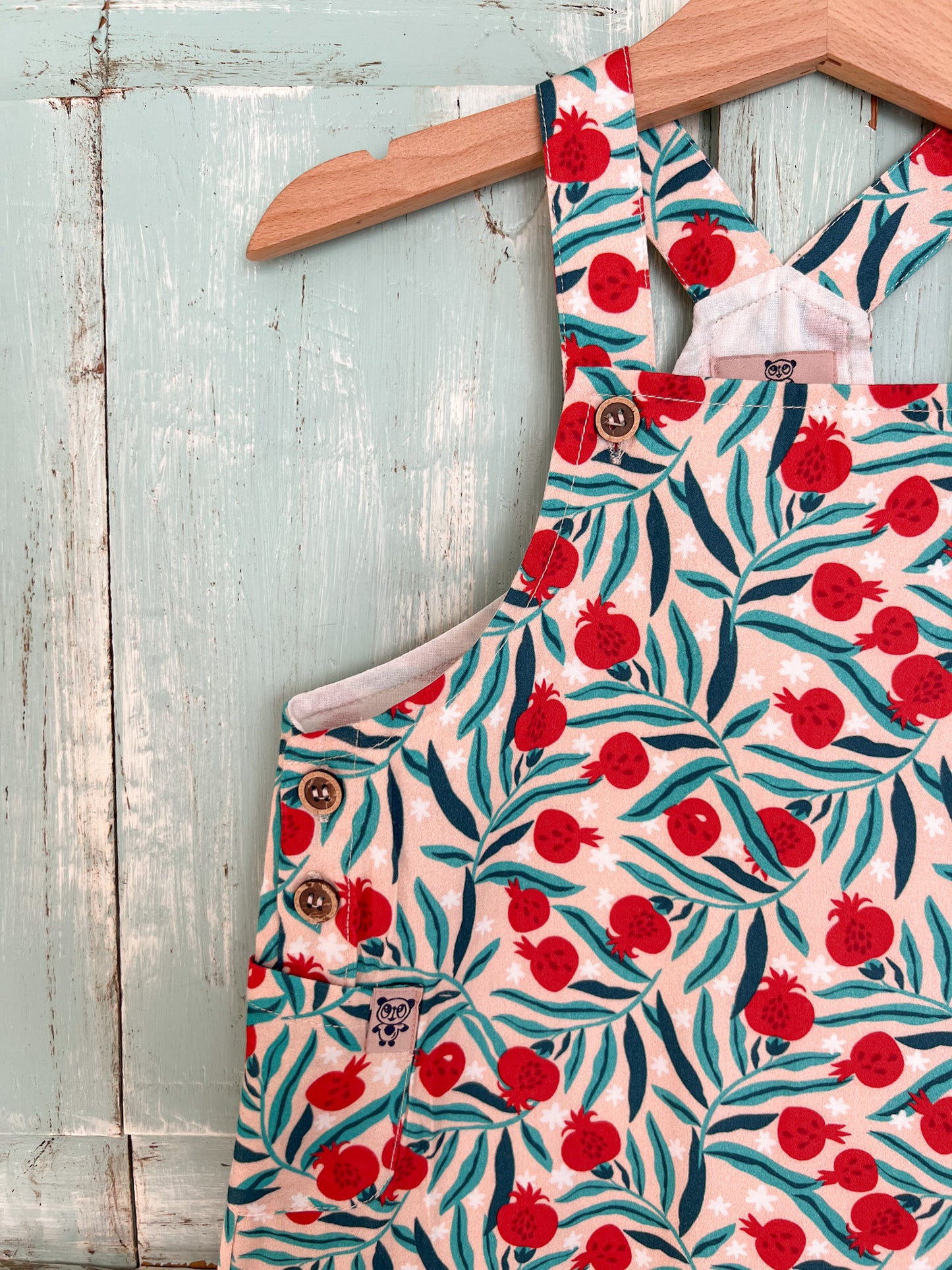 Lucy romper in pomegranate